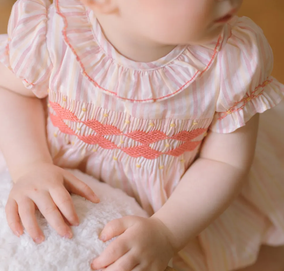 Capucine Pink Yellow Stripe Smocked Romper