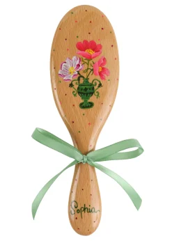 Hairbrush in Green Vase
