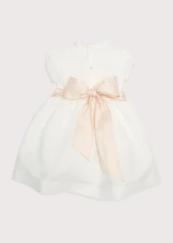 Hand Smocked Occasion Dress in Ivory with Pink Details